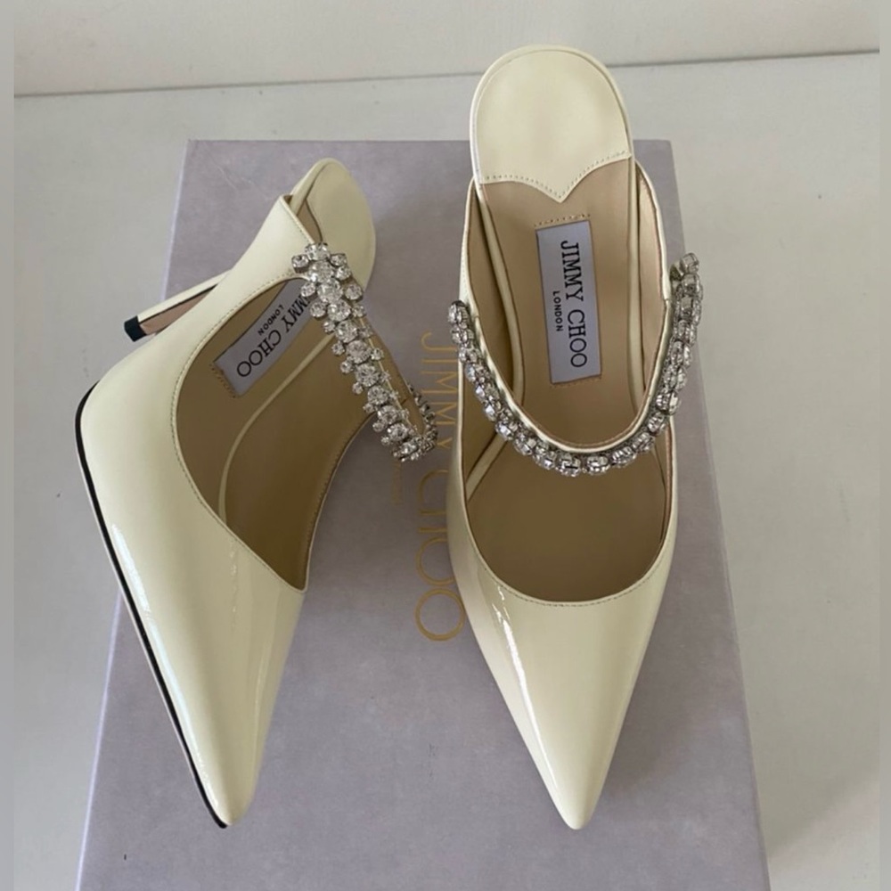 Jimmy Choo 100 bing shoes mules.